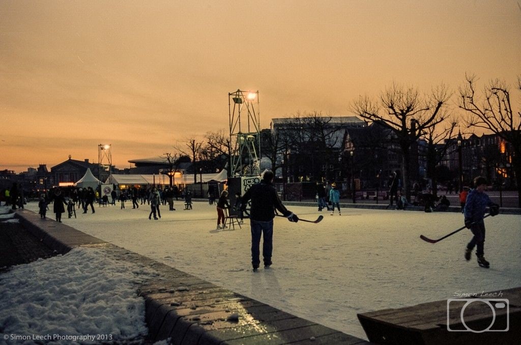 Ice skating on Museumplein. Every year the Museumplein is covered over with an artificial ice rink. At this point of the day the light was dropping off pretty quickly