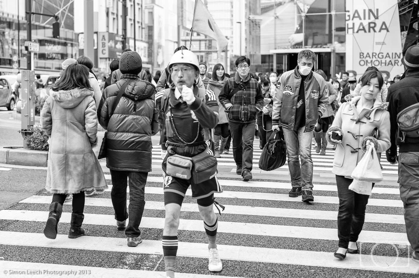 Saving the world, one step at a time. You meet some odd people in Tokyo. He was a quick chap. Completely missed my focus.....